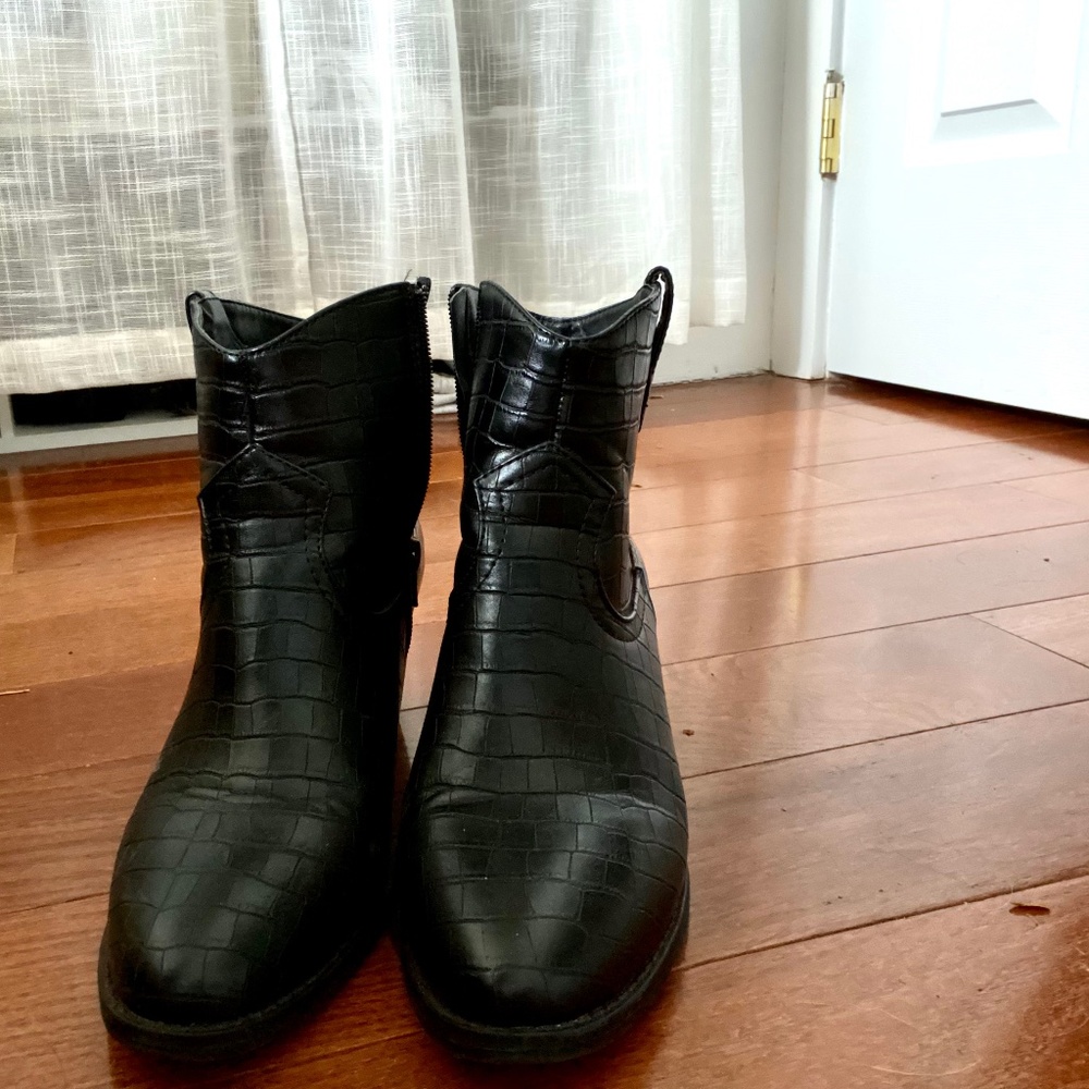 Black, textured ankle boots with pointed toes and a 2.5” heel